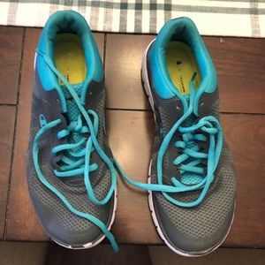 Teal and grey Champion shoes.